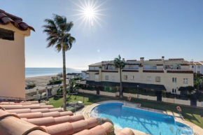 Luxury modern beachfront 3 bed gated community townhouse with pool, sun terrace, sea views close to all amenities